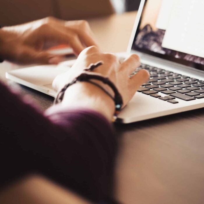 entrepreneur-working-on-his-macbook-2