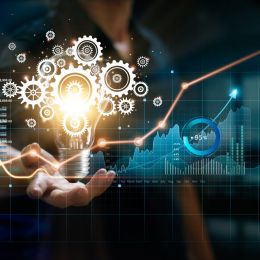 Businessman holding light bulb and cog inside. Creative and inspiration. Media and new idea for business of finance and economic growth. Innovation and technology on network.